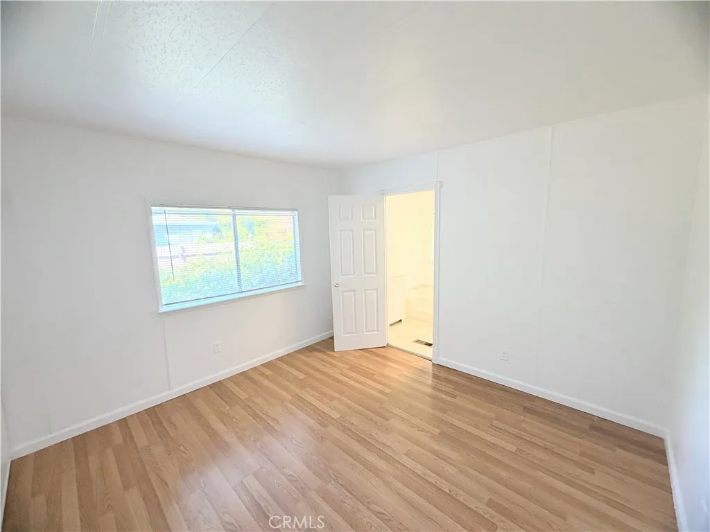 Primary Bedroom with bathroom suite