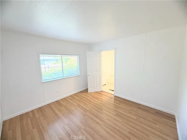 Primary Bedroom with bathroom suite