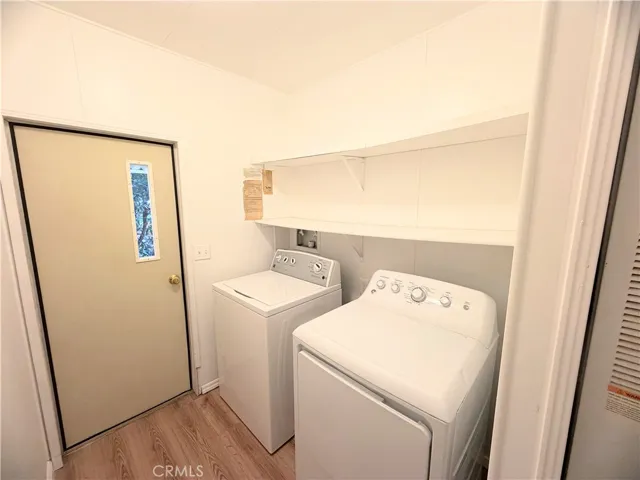 Laundry Room with access to the carport