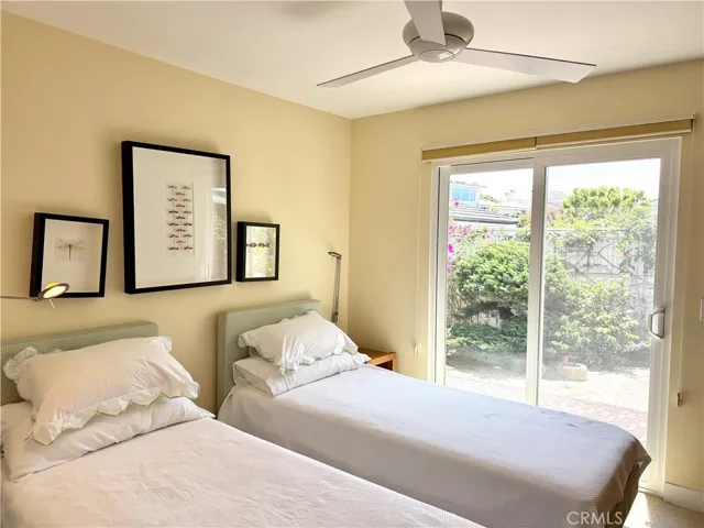 Scond bedroom with garden views