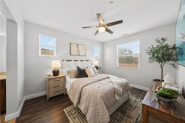 Primary Suite equipped for a King Size Bed with upgraded luxury vinyl plank floors.