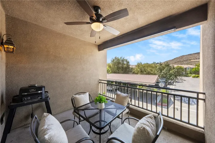Covered Balcony with upgraded overhead fan.