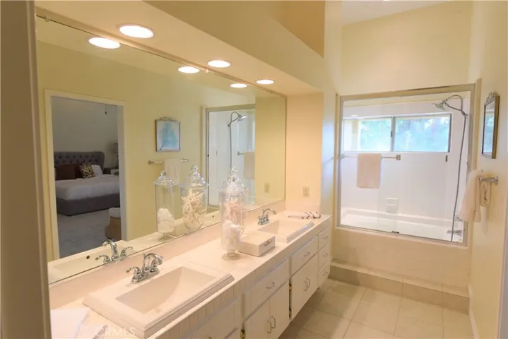 master bathroom with high ceilng