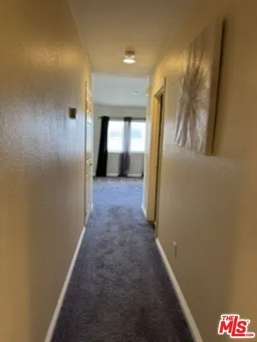 Hallway leading to bedrooms