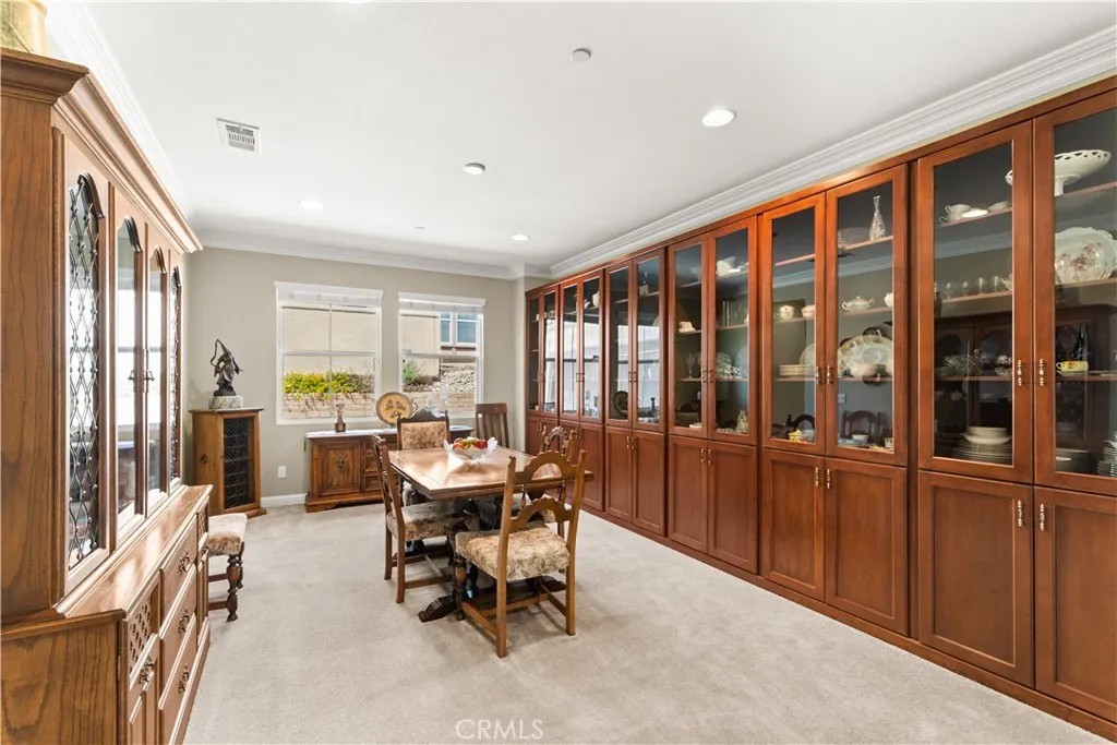Formal Dining room with built in display case