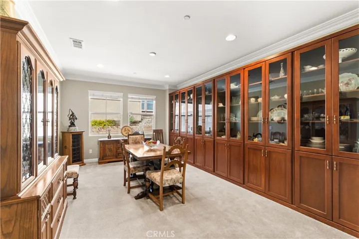 Formal Dining room with built in display case
