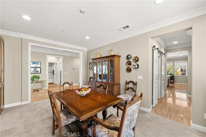 From formal dining room you have access to laundry, garage, and kitchen