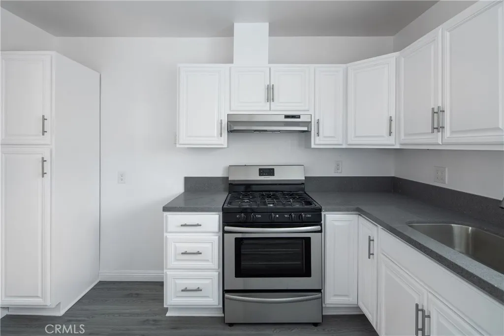 Unit E, photo taken in 2019, currently tenant occupied and condition will differ.
