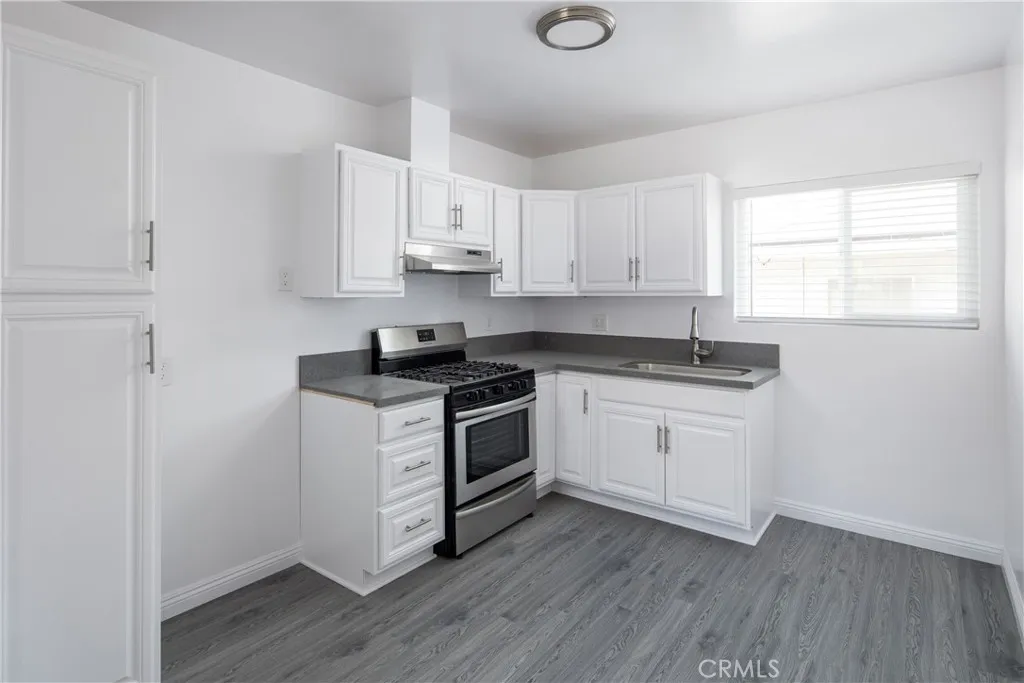 Unit E, photo taken in 2019, currently tenant occupied and condition will differ.