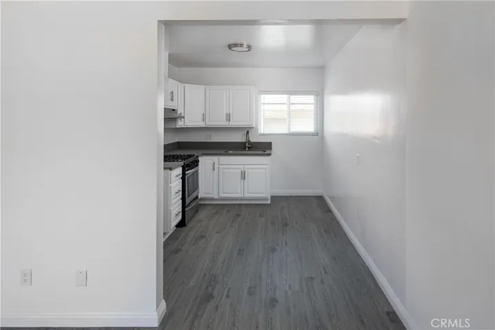 Unit E, photo taken in 2019, currently tenant occupied and condition will differ.