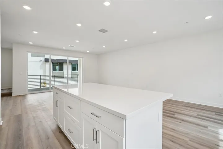 Great room with stunning stacking doors leading out to deck
