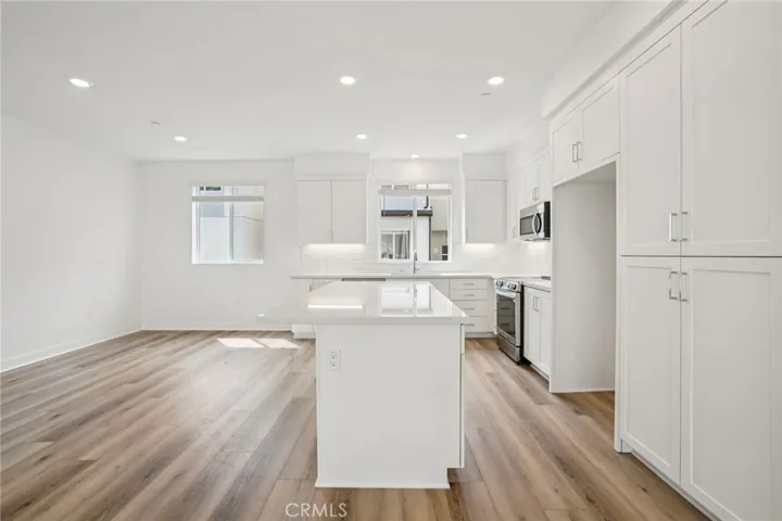 Great room with stunning stacking doors leading out to deck