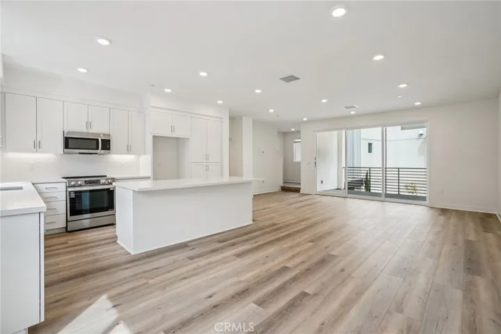 Great room with stunning stacking doors leading out to deck