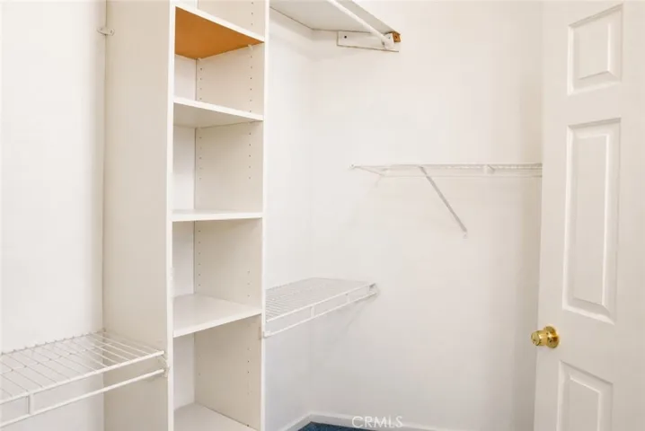 Master  bedroom walk in closet