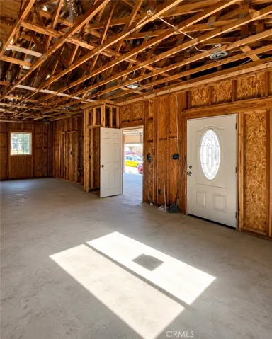 Open Concept living area under construction with vaulted ceilings