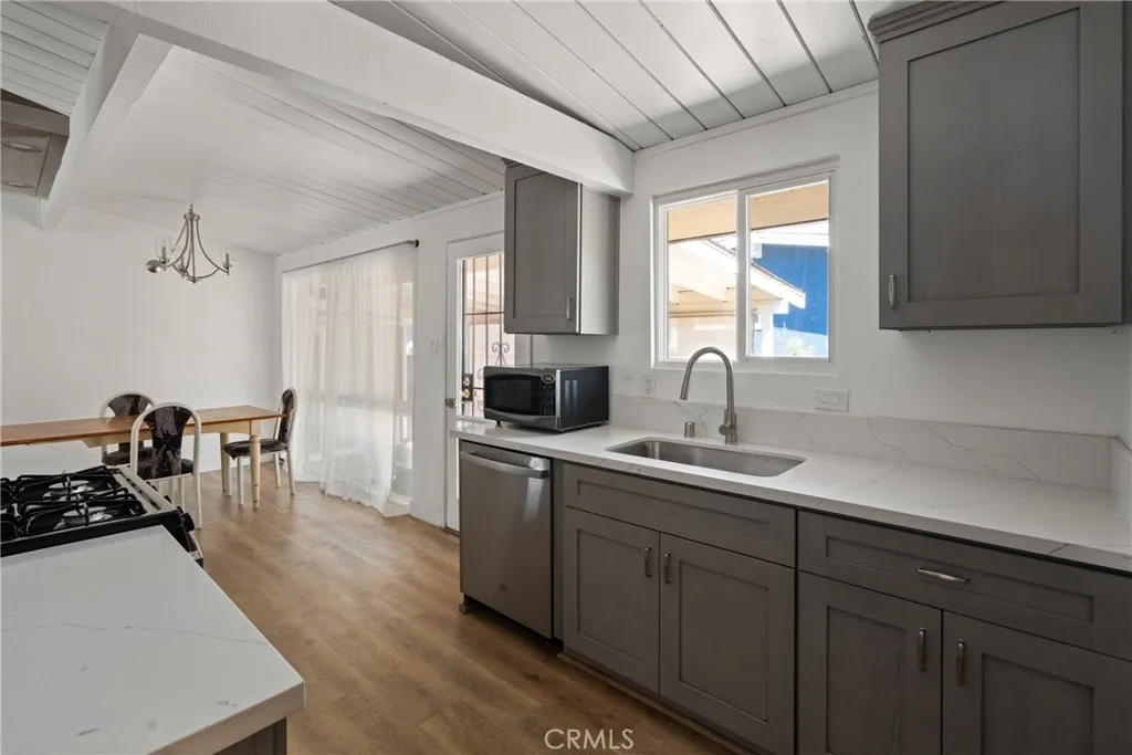 The kitchen looks into the dining area