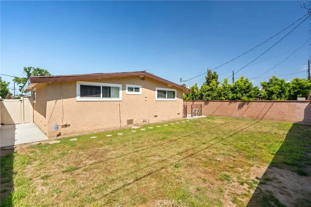 15420 Bonsallo Ave has a large backyard with a ton of potential