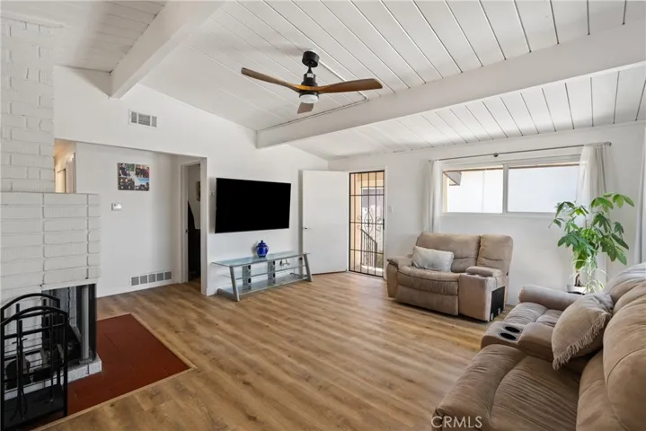 Airy living room with fireplace | Original Photo