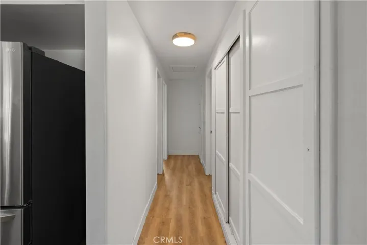 The hallway leads the way to 3 bedrooms
