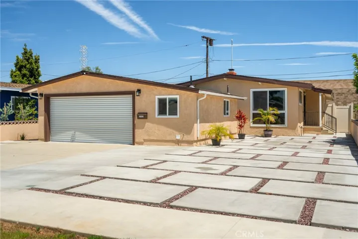 The driveway and pavers allow for at least 6 off-street parking spots