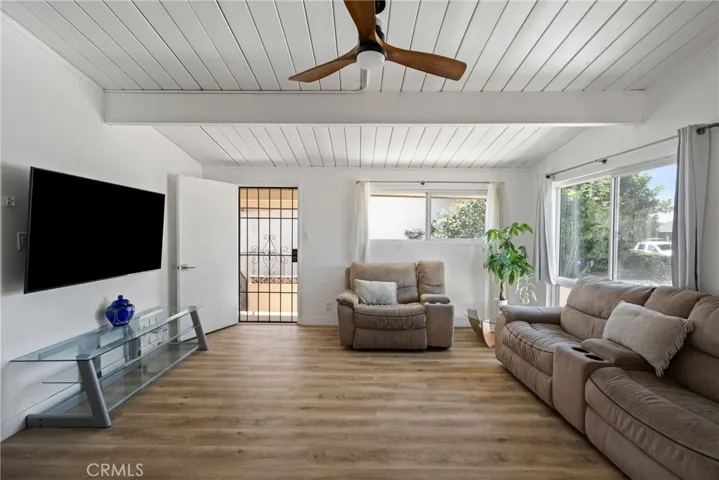 This large living room offers great TV viewing and is perfect for large gatherings. | Original Photo