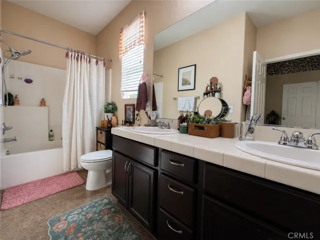 Full "Jack and Jill" bathroom shared by Bedroom #3 and #4