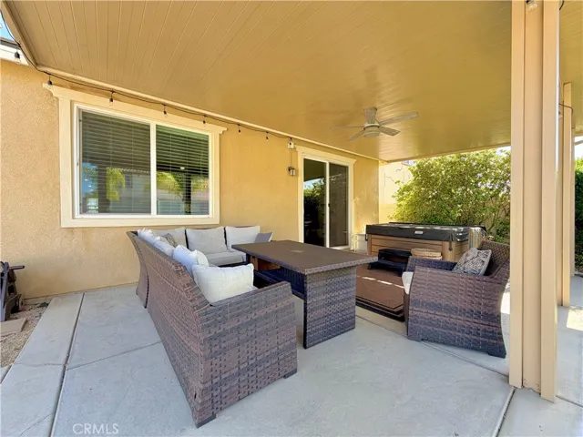 Solid shade patio cover with low maintenance finishes. Lots of space for full set of patio furniture