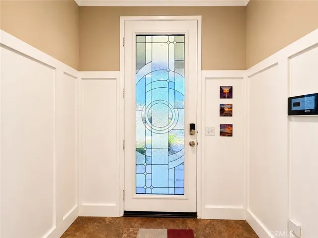 Custom stained glass front door with elegant and welcoming curves