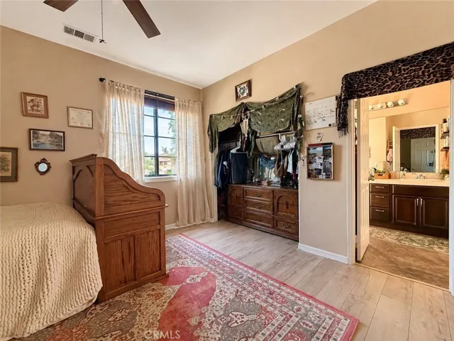 Bedroom #4 with door to Jack and Jill bathroom shared with bedroom #3