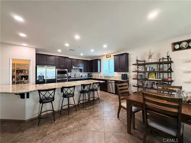 Breakfast nook with room to seat everyone at the party, lay out the potluck buffet, cool multiple racks of cookies over the holiday, or supervise everyone's homework while you cook dinner.
