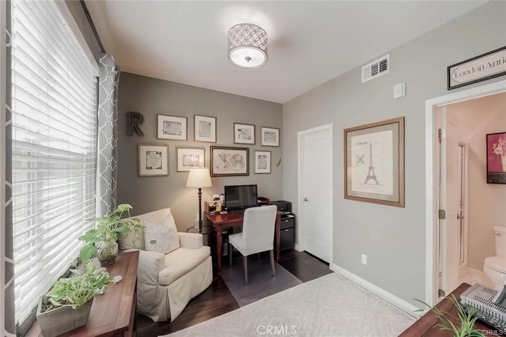 This was used as an office, but it is also used as bedroom with A Full walk in Closet and a Full Bathroom and a lovely picture window to enjoy the nice breeze and work at during the daytime hours.