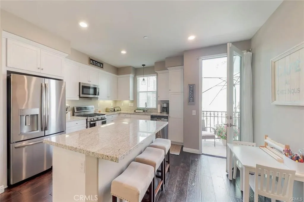 The Back of the home opens up to an enclosed patio area to step out and enjoy your first coffee and enjoy the Lovely Breeze of Anaheim, or the Sounds of Disneyland and the fireworks.
