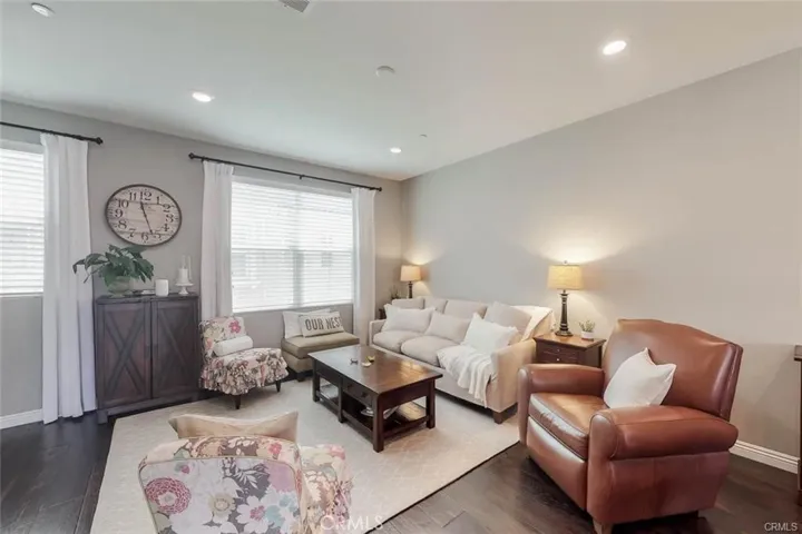 The Living room Staged from another angle. Beautiful wood flooring throughout this floor.