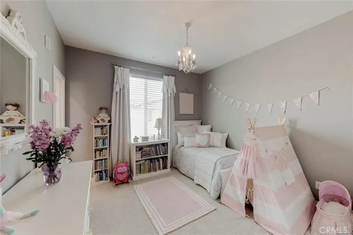This bedroom has it's own separate Bathroom with special custom Flooring is A full Bath located on the 3rd floor of the home. Along with a built in bath