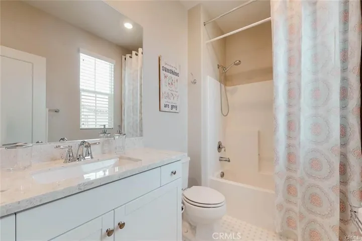 Separate Bathroom that is Accessed from the through the second Bedroom on the 3rd Floor.