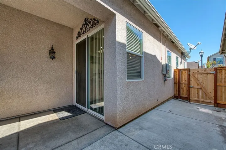 side yard and covered patio