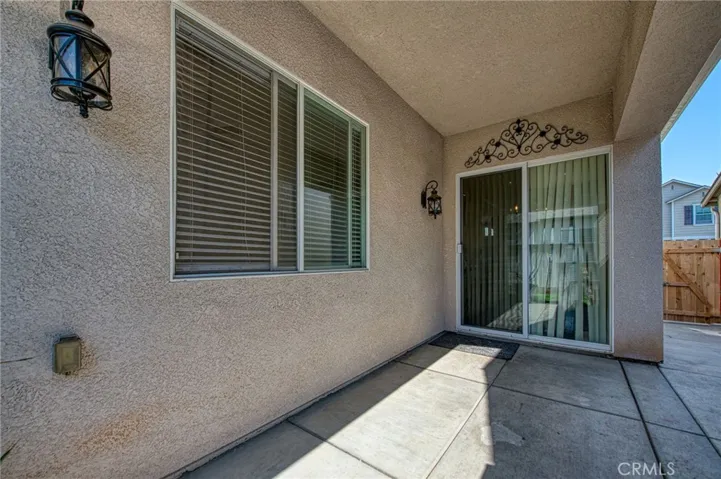 side yard and covered patio