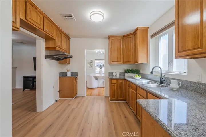 Kitchen has direct access to the family room and dining room.