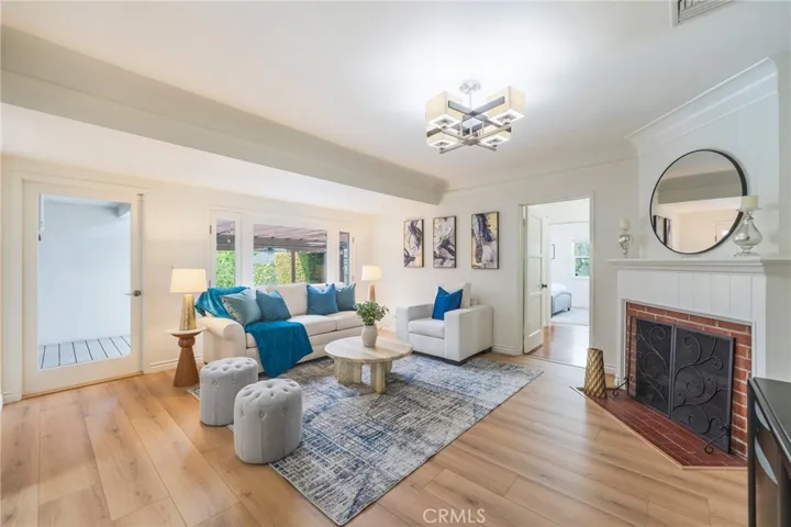 Family room with a direct access to the spacious patio and backyard. Great view of the pool.