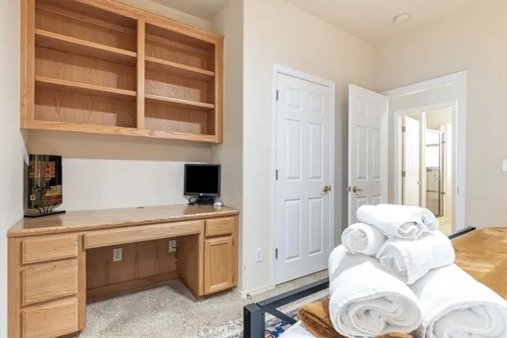 Guest bedroom with built in desk