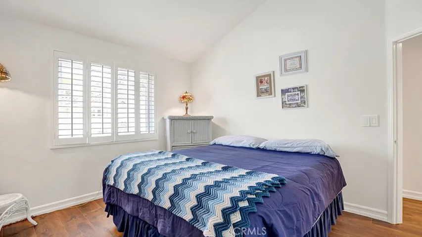The guest bedroom also has vaulted ceilings.