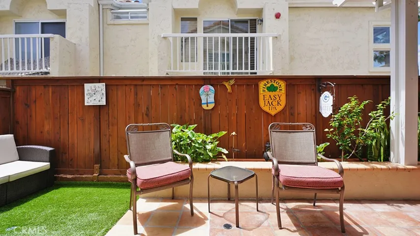 The backyard is low maintenance and has a garden bed for some landscaping.