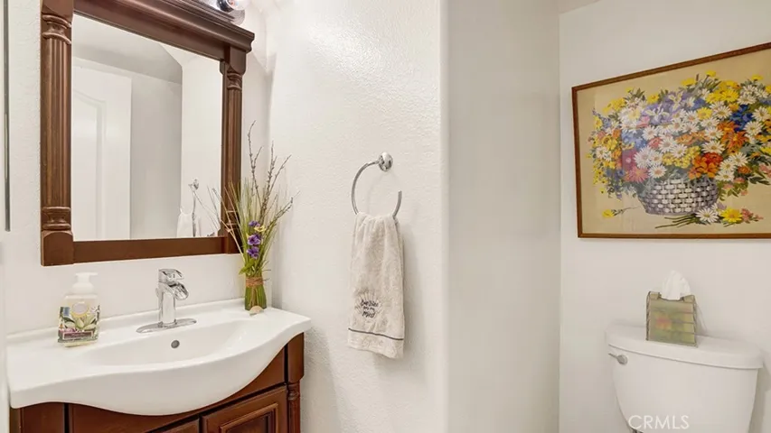 Downstairs is a half bath for guests.