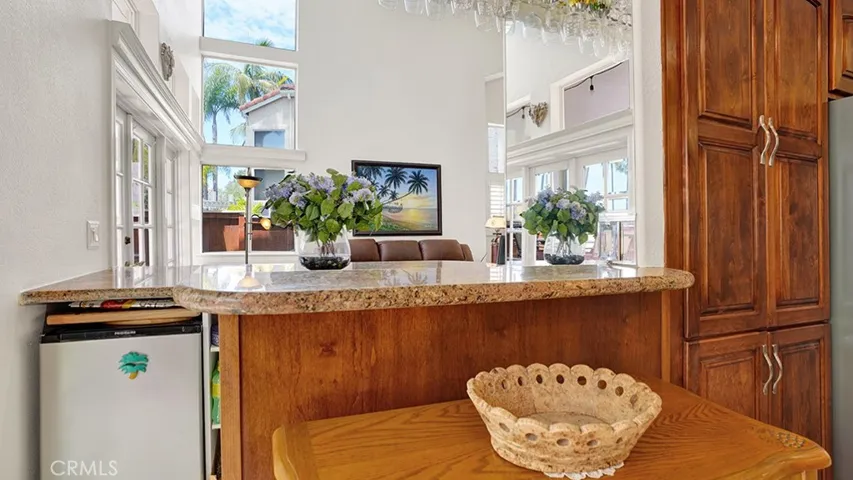 The wet bar area was installed where a pony wall used to be.