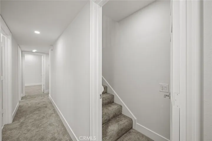 Stairs leading to 3rd floor Primary suite