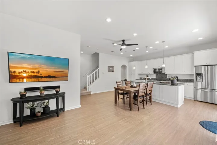 Great Room View Towards Stairs & Garage Access