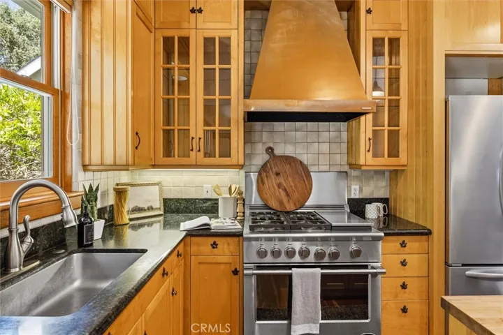 copper hood on the high end gas/range with grill