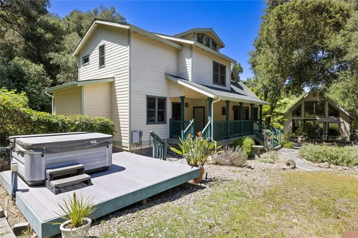 Jacuzzi is located in front yard of main home