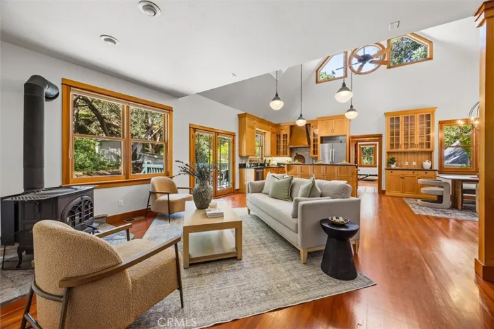 Great room and kitchen, with multiple windows and french doors!