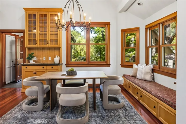 Dining area just to the right of the front door, offers window searing, a built in hutch and beautiful views